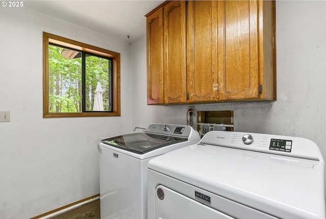 14216 NE 346th St, Battle Ground, WA 98604 - laundry area featuring cabinet space and separate washer and dryer