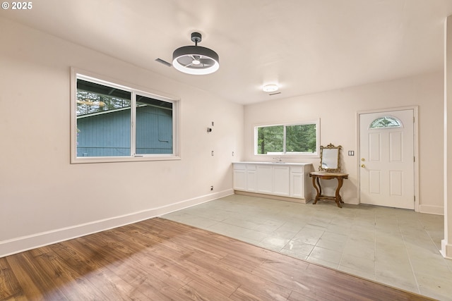 14216 NE 346th St, Battle Ground, WA 98604 - entrance foyer featuring baseboards and light wood finished floors