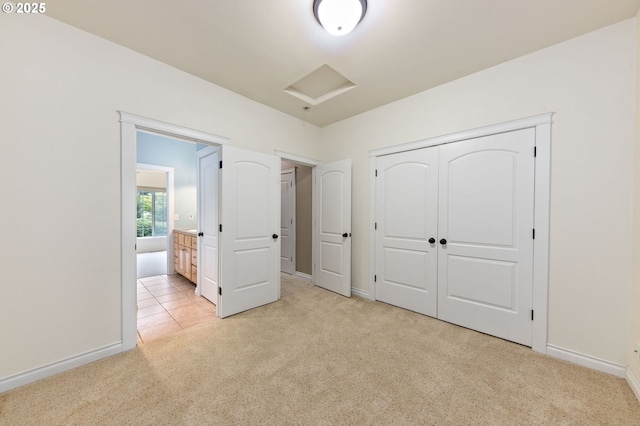 115 Duane Ct, Myrtle Creek, OR 97457 - unfurnished bedroom with light colored carpet, attic access, baseboards, and a closet