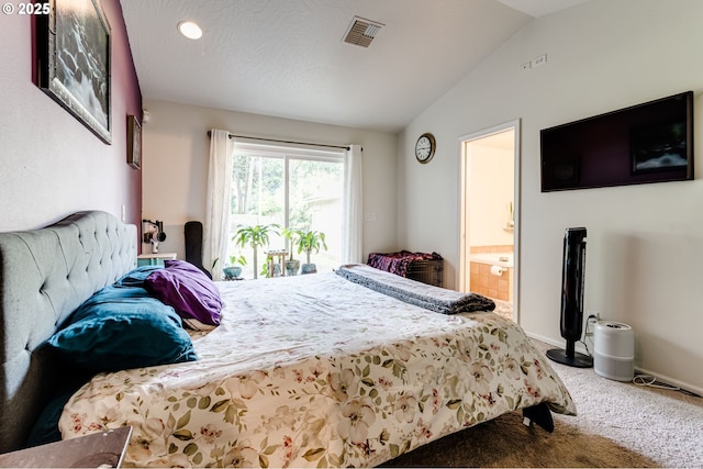 carpeted bedroom featuring ensuite bath, vaulted ceiling, and access to outside