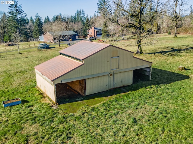 view of outdoor structure with a lawn