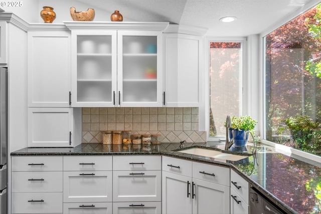 1433 SE 49th Ct, Hillsboro, OR 97123 - interior space with a sink, dark stone counters, and white cabinets