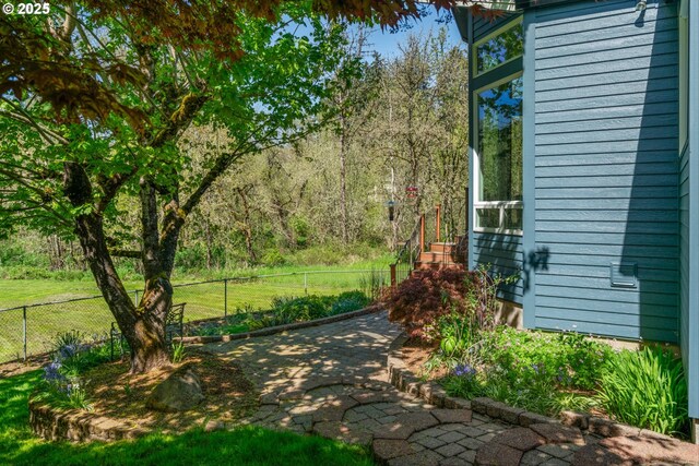 1433 SE 49th Ct, Hillsboro, OR 97123 - bedroom featuring baseboards, a textured ceiling, and wood finished floors