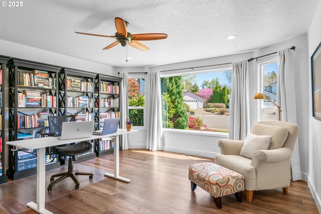 1433 SE 49th Ct, Hillsboro, OR 97123 - doorway to outside featuring a textured ceiling, ceiling fan, and wood finished floors