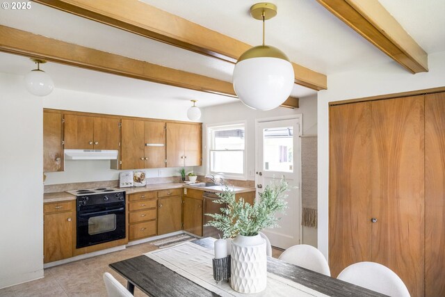 kitchen featuring under cabinet range hood, beam ceiling, black electric range oven, brown cabinetry, and dishwasher