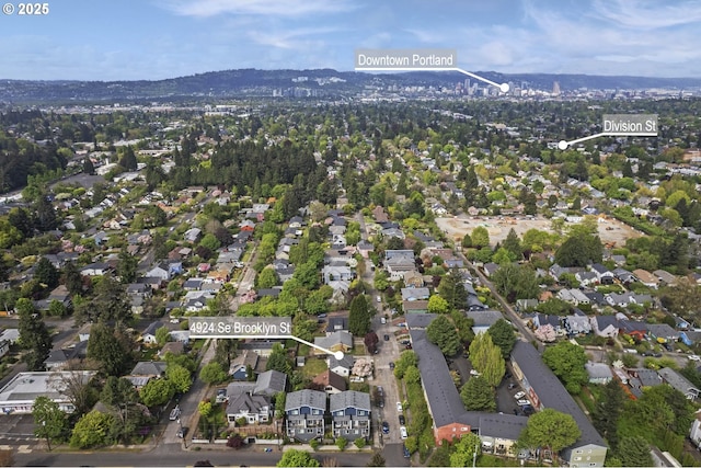 bird's eye view with a residential view and a mountain view