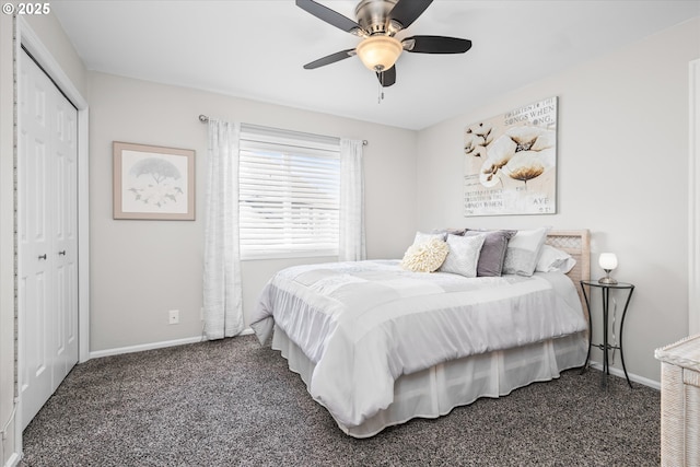 carpeted bedroom featuring baseboards, a closet, and ceiling fan