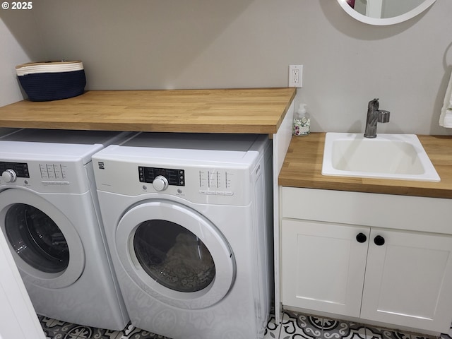23538 NW Saint Helens Rd Unit S5, Portland, OR 97231 - laundry room featuring washing machine and dryer and cabinet space