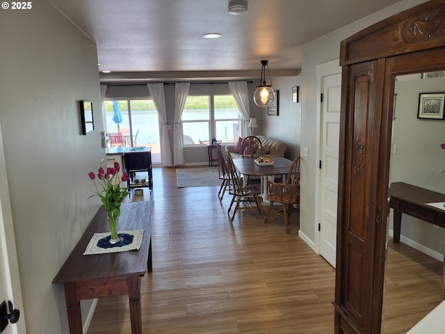 23538 NW Saint Helens Rd Unit S5, Portland, OR 97231 - dining area featuring wood finished floors and baseboards