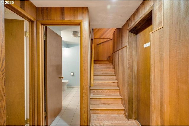 stairs featuring tile patterned floors