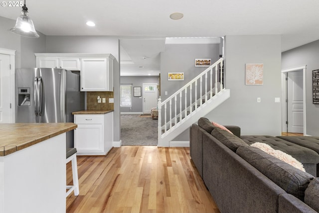 14818 NE 23rd Ave, Vancouver, WA 98686 - living room featuring stairway, light wood finished floors, and recessed lighting