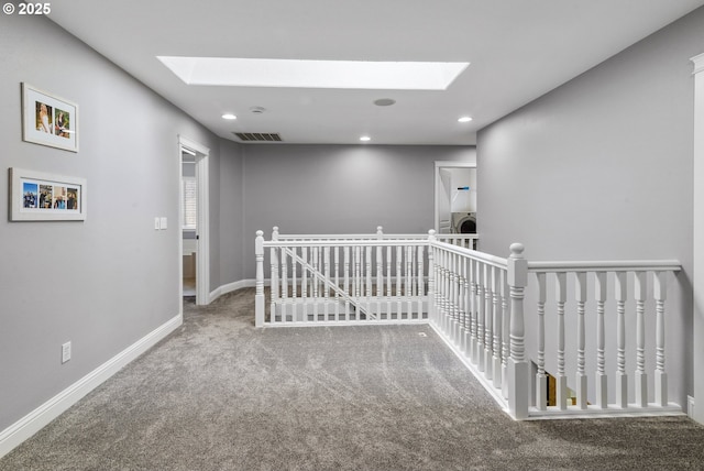 14818 NE 23rd Ave, Vancouver, WA 98686 - hallway featuring a skylight, an upstairs landing, carpet floors, recessed lighting, and washer / dryer