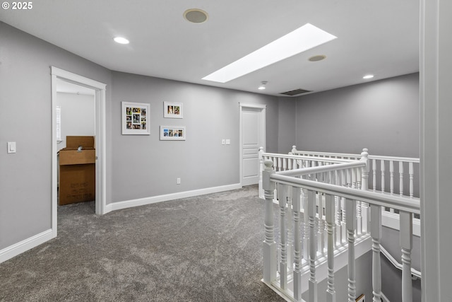 14818 NE 23rd Ave, Vancouver, WA 98686 - hallway with an upstairs landing, carpet flooring, a skylight, and recessed lighting