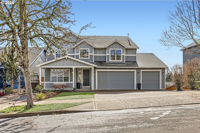 12998 SW Kostel Ln, Portland, OR 97224 - traditional-style house with a porch, board and batten siding, roof with shingles, driveway, and a garage