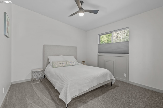 bedroom featuring carpet floors, baseboards, and ceiling fan