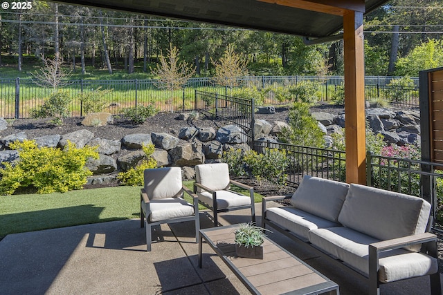 view of patio featuring a fenced backyard and an outdoor living space