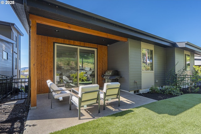 rear view of house featuring a patio