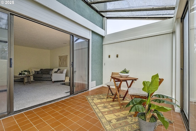 sunroom with a skylight