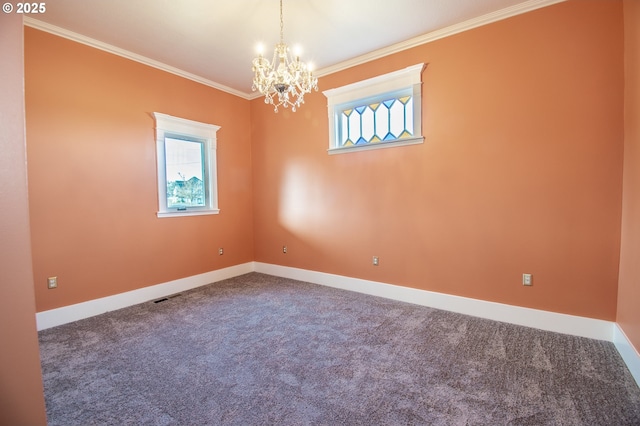 carpeted spare room featuring ornamental molding and a notable chandelier