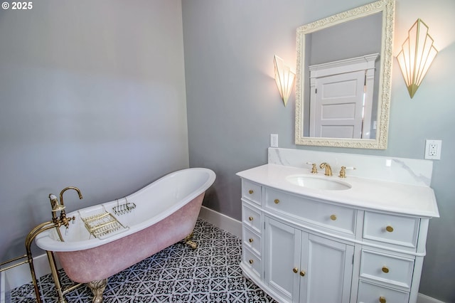 bathroom with vanity, a tub, and tile patterned flooring