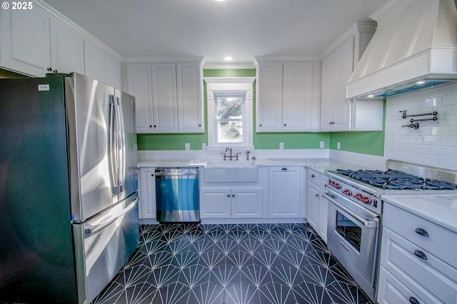 kitchen featuring sink, white cabinetry, stainless steel appliances, and custom exhaust hood