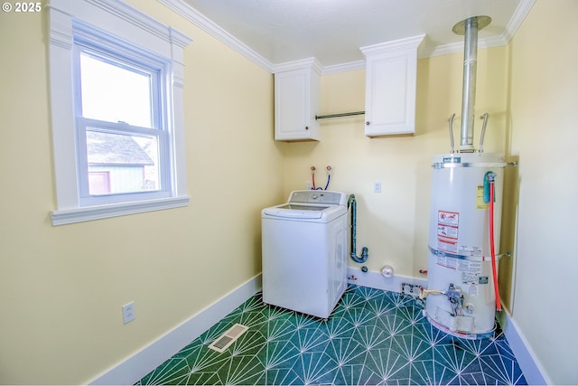 washroom with cabinets, ornamental molding, water heater, and washer / clothes dryer