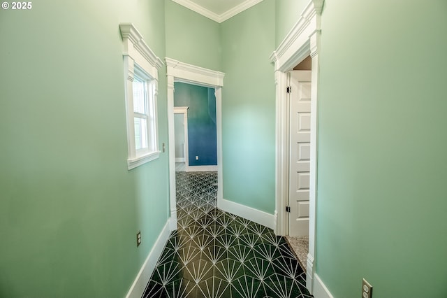 corridor featuring crown molding