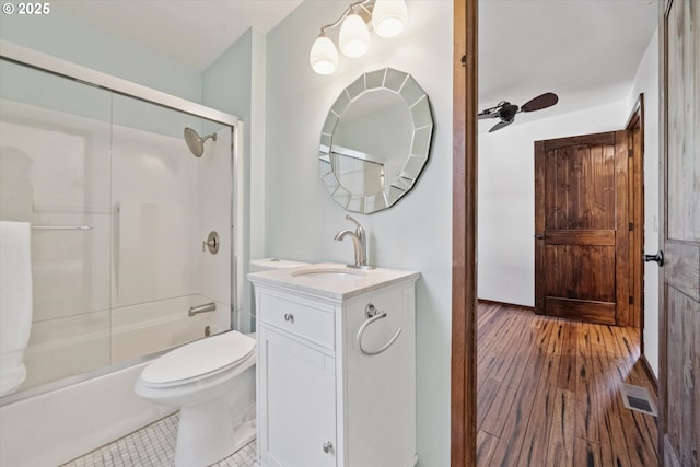 6035 NE 9th Ave, Portland, OR 97211 - bathroom with vanity, bath / shower combo with glass door, and wood finished floors