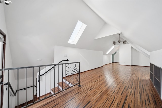 6035 NE 9th Ave, Portland, OR 97211 - bonus room featuring a skylight, lofted ceiling, and wood finished floors