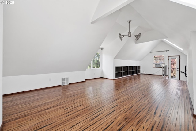 6035 NE 9th Ave, Portland, OR 97211 - additional living space with lofted ceiling, plenty of natural light, hardwood / wood-style floors, and cooling unit
