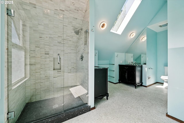 6035 NE 9th Ave, Portland, OR 97211 - bathroom with vanity, a shower stall, a skylight, and lofted ceiling