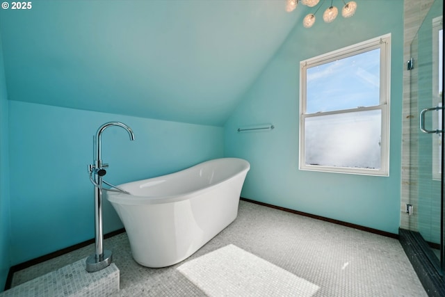 6035 NE 9th Ave, Portland, OR 97211 - bathroom with vaulted ceiling, a soaking tub, and a shower stall