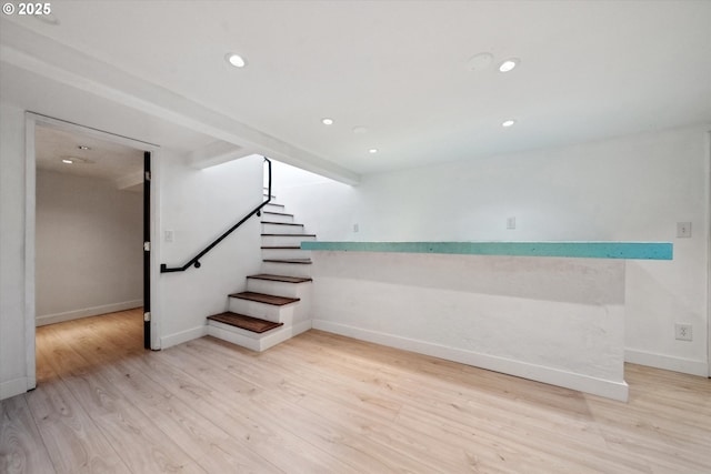6035 NE 9th Ave, Portland, OR 97211 - finished below grade area with stairs, light wood-style floors, and recessed lighting