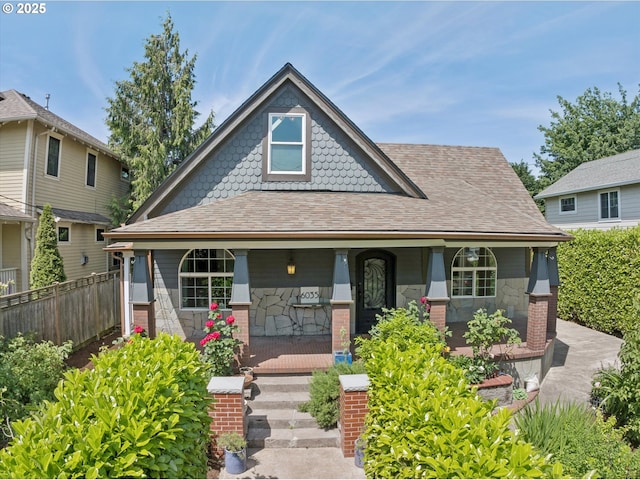 6035 NE 9th Ave, Portland, OR 97211 - view of front facade featuring a porch and a shingled roof