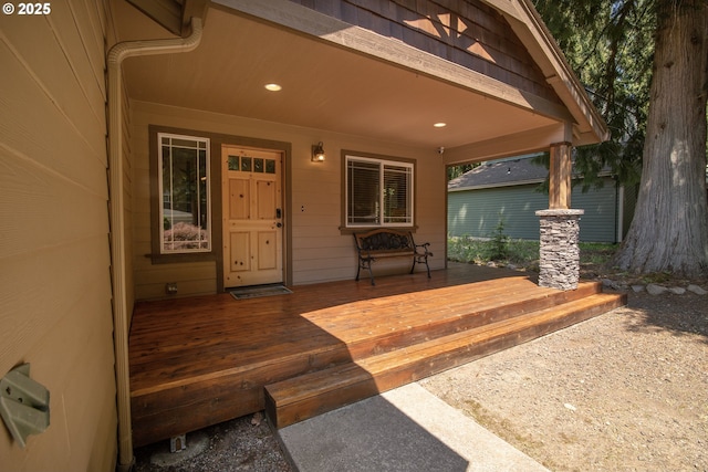 entrance to property with covered porch