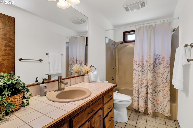 bathroom with shower / tub combo with curtain, tile patterned flooring, vanity, and visible vents