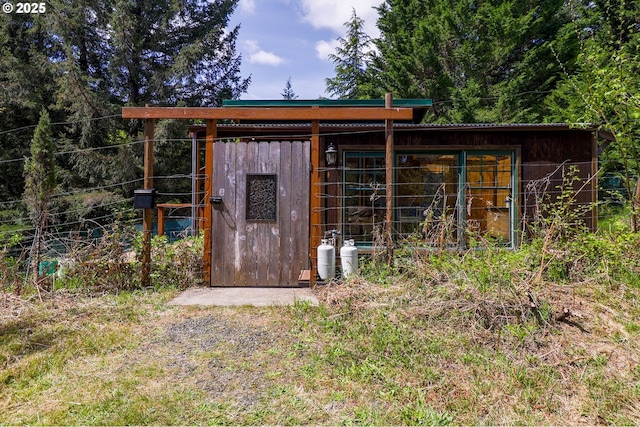 view of outbuilding featuring an outdoor structure