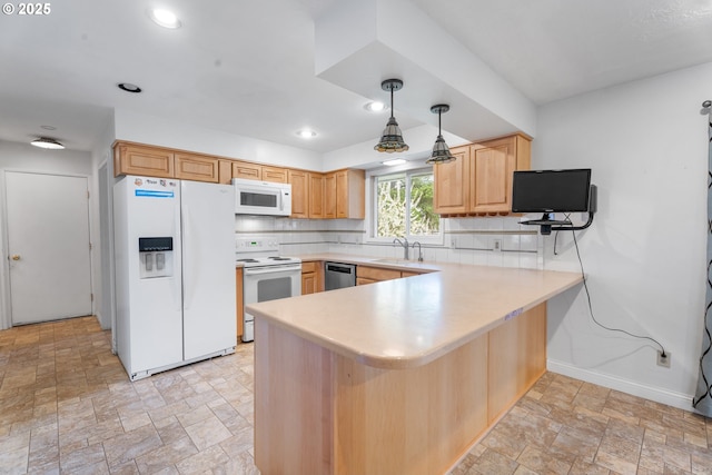 1604 NE 153rd Pl, Portland, OR 97230 - kitchen with white appliances, a peninsula, stone finish floors, light countertops, and tasteful backsplash