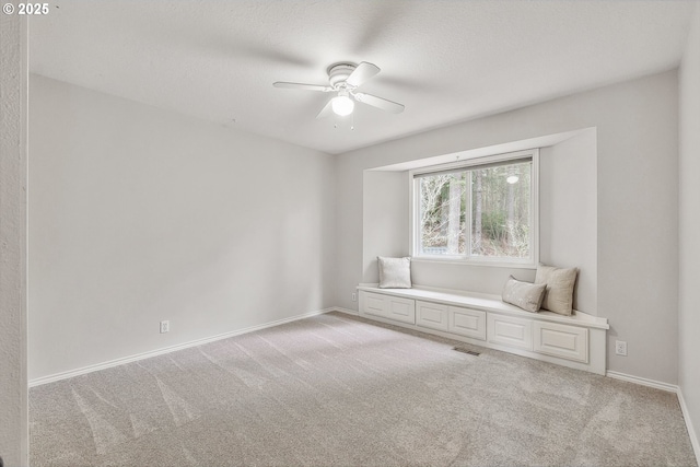 10915 SW Mourning Dove Pl, Beaverton, OR 97007 - unfurnished room featuring baseboards, a ceiling fan, light colored carpet, and visible vents