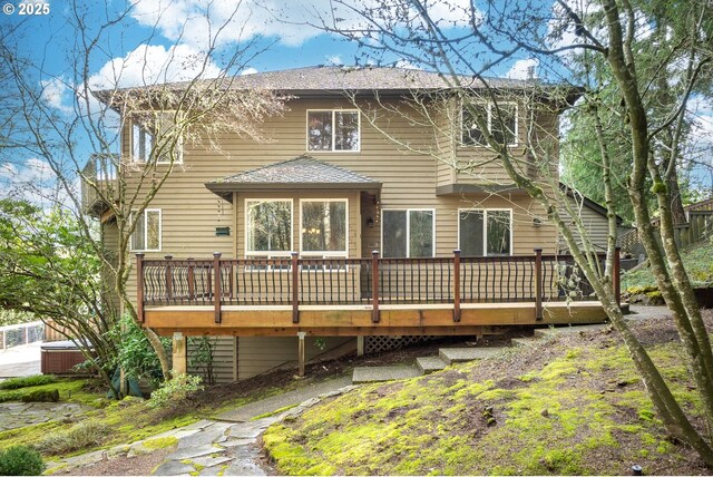 10915 SW Mourning Dove Pl, Beaverton, OR 97007 - rear view of property with roof with shingles, a wooden deck, and a hot tub