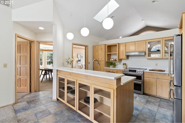 1249 Crenshaw Rd, Eugene, OR 97401 - kitchen with appliances with stainless steel finishes, lofted ceiling, under cabinet range hood, a skylight, and stone finish flooring