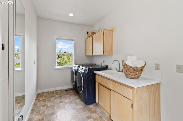 1249 Crenshaw Rd, Eugene, OR 97401 - laundry area featuring cabinet space, independent washer and dryer, baseboards, stone finish flooring, and recessed lighting