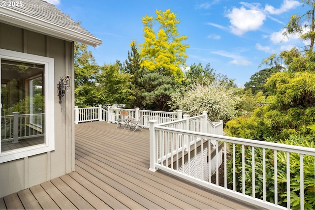 1249 Crenshaw Rd, Eugene, OR 97401 - wooden terrace featuring view of scattered trees and outdoor dining space