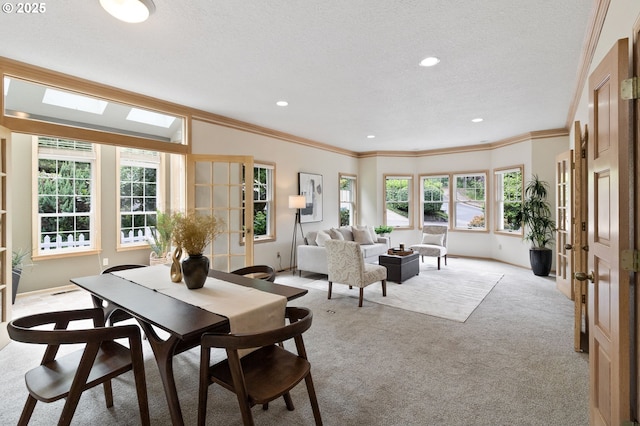 1249 Crenshaw Rd, Eugene, OR 97401 - dining space with light carpet, crown molding, a textured ceiling, recessed lighting, and baseboards