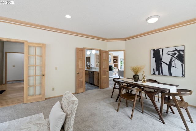 1249 Crenshaw Rd, Eugene, OR 97401 - dining space featuring light colored carpet, crown molding, french doors, and baseboards