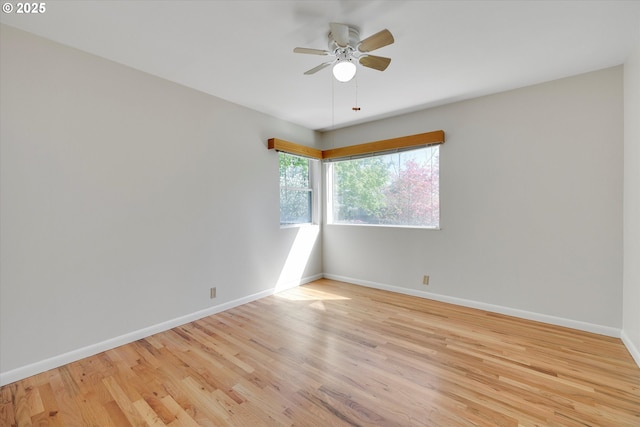 4133 SE Henderson St, Portland, OR 97202 - empty room featuring a ceiling fan, baseboards, and light wood-style flooring