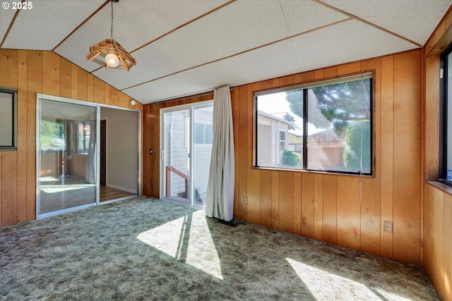 4133 SE Henderson St, Portland, OR 97202 - spare room featuring carpet floors, wood walls, and lofted ceiling