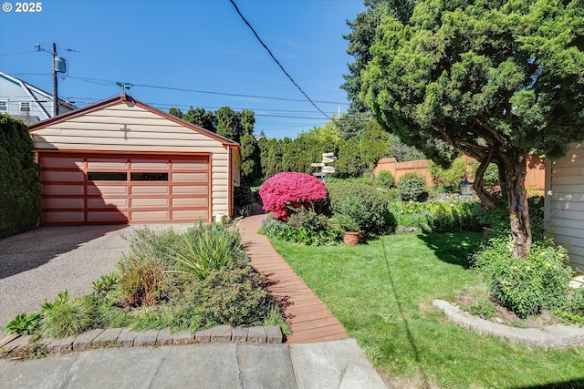 4133 SE Henderson St, Portland, OR 97202 - view of yard with a detached garage, fence, and an outbuilding