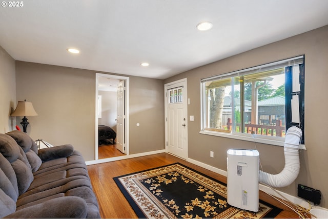9819 SE Knight St, Portland, OR 97266 - entryway with wood finished floors and recessed lighting
