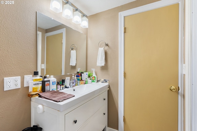 9819 SE Knight St, Portland, OR 97266 - bathroom featuring vanity and a textured wall